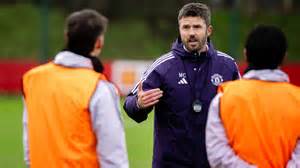 Foto di Michael Carrick sulla panchina del Manchester United