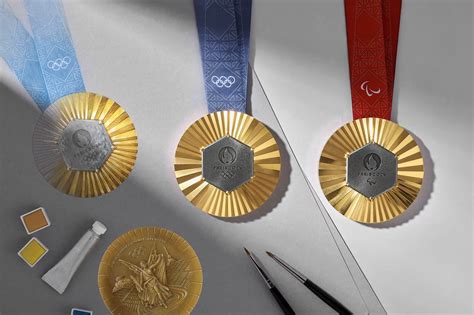 Malcom con la medaglia d'oro olimpica